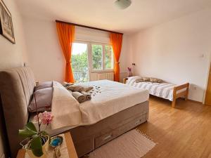 Postel nebo postele na pokoji v ubytování House Helena