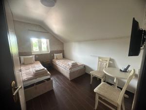 Postel nebo postele na pokoji v ubytování Beauty Complex