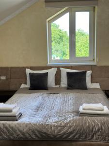 Postel nebo postele na pokoji v ubytování Beauty Complex
