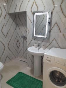 Ένα μπάνιο στο Mamos Apartment