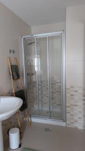 a bathroom with a shower and a sink at Cantiño 39 in Lugo +32 photos
