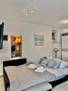 Postel nebo postele na pokoji v ubytování Javor Residence Studio Apartman