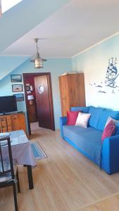 Χώρος καθιστικού στο Apartament Żeglarz