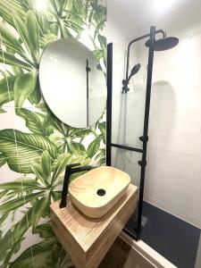 a bathroom with a sink and a mirror at Luxury apartment in the heart of Sofia in Sofia