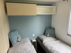 Ένα ή περισσότερα κρεβάτια σε δωμάτιο στο wallerseehomes 110