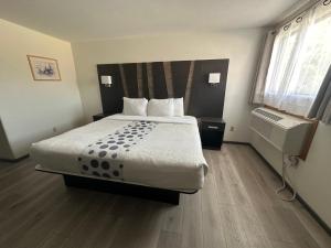 Letto o letti in una camera di Hotel 191 - Moab