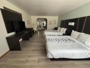 Letto o letti in una camera di Hotel 191 - Moab
