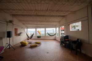 TV a/nebo společenská místnost v ubytování Antigua Hostal