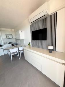 Η κουζίνα ή μικρή κουζίνα στο Studio cabine vue mer +9 φωτογραφίες