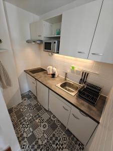 Køkken eller tekøkken på T1 bis rénové Grenoble et parking