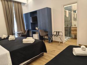 Posteľ alebo postele v izbe v ubytovaní Maison Arena