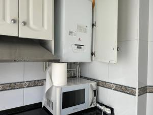 Kuchyň nebo kuchyňský kout v ubytování nice room en suite