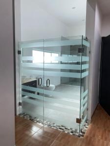 Postel nebo postele na pokoji v ubytování Hotel Casa Bendicion