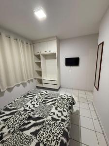 Postel nebo postele na pokoji v ubytování Seu refúgio em Caldas Novas + 9 fotografií