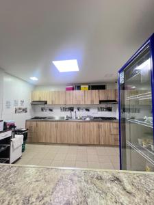 Kuchyň nebo kuchyňský kout v ubytování Garden Home Hostal