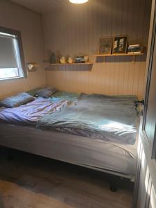 Postel nebo postele na pokoji v ubytování Sólvellir