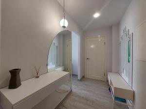 En eller flere senge i et værelse på Стильний Люкс Яровиця