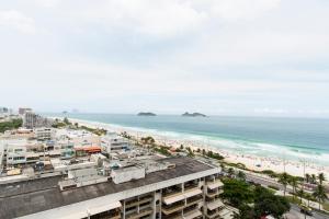 an aerial view of a beach and the ocean at Barra Palace in Rio de Janeiro