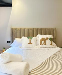 Ένα ή περισσότερα κρεβάτια σε δωμάτιο στο Menara Prestige Duplex 4BR with Pool Access