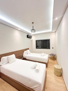 Ένα ή περισσότερα κρεβάτια σε δωμάτιο στο Menara Prestige Duplex 4BR with Pool Access
