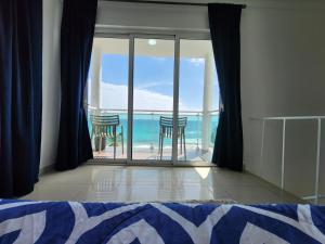 Postel nebo postele na pokoji v ubytování PENTHOUSE VUE MER - Boca Chica + 28 fotografií