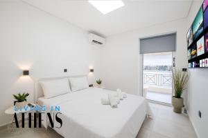 Ein Bett oder Betten in einem Zimmer der Unterkunft Athenian Exclusive residence 4&2 ppl