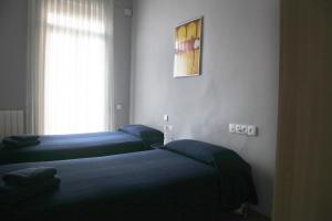 Postel nebo postele na pokoji v ubytování Luxury Central Apartment