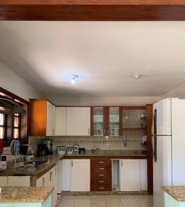 Kuchyň nebo kuchyňský kout v ubytování Verdadeiro Paraíso