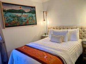 Postel nebo postele na pokoji v ubytování Coastal Escape