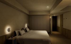Postel nebo postele na pokoji v ubytování Hotel JAL City Toyama