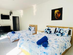 Giường trong phòng chung tại Billabong Golf Club & Resort +30 ảnh