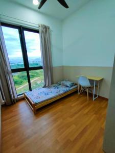 Кровать или кровати в номере Budget Homestay by MyPOCKETT +9 фотографий