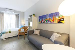 Posteľ alebo postele v izbe v ubytovaní Poble Sec Apartment