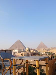 Imagem da galeria de New pyramids way em Cairo