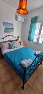Cama ou camas em um quarto em Sausan Hotel