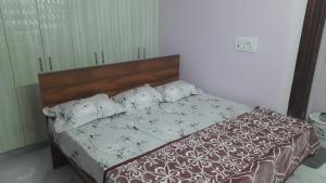 Ένα ή περισσότερα κρεβάτια σε δωμάτιο στο VS Homestay