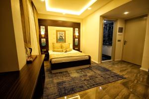 Кровать или кровати в номере Venus Suite Hotel