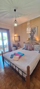 Cama ou camas em um quarto em Sausan Hotel