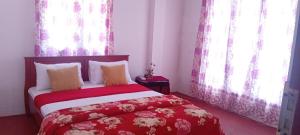 Letto o letti in una camera di Stay Logi Nanuoya