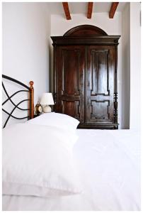 Postel nebo postele na pokoji v ubytování Guest House Tragurion