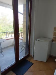 Balkón nebo terasa v ubytování B&B Denteferro