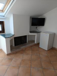 Kuchyň nebo kuchyňský kout v ubytování B&B Denteferro