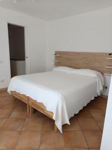 Postel nebo postele na pokoji v ubytování B&B Denteferro + 37 fotografií