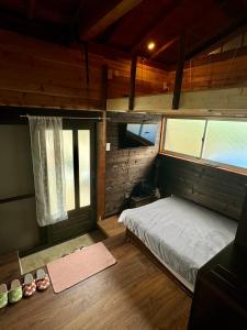 Postel nebo postele na pokoji v ubytování Astuto Riders House