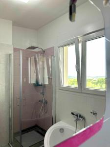 a bathroom with a shower and a toilet and a sink at Sunrise Villa in Kassandria +108 photos