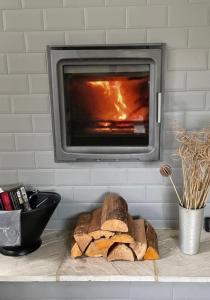 a loaf of bread on a counter with a fireplace at 3 The Mews in Ryde