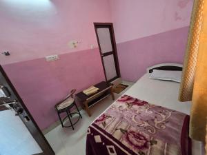 Postel nebo postele na pokoji v ubytování Hotel Welcome Nepal
