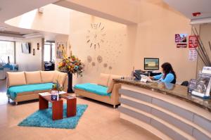 TV a/nebo společenská místnost v ubytování Hotel de las Américas - Ambato