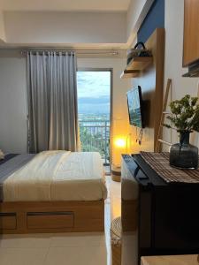 Postel nebo postele na pokoji v ubytování Springwood Residences by Kakarama Room