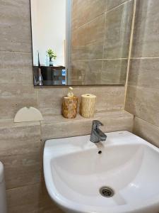 Koupelna v ubytování Springwood Residences by Kakarama Room